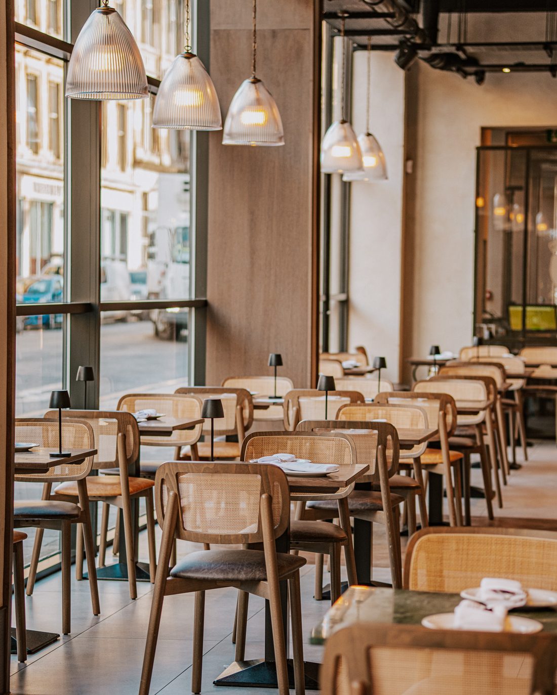 Window tables looking onto Ingram Street
